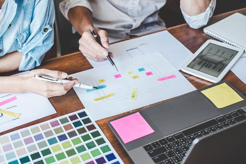 team of web designers designing minimalist website